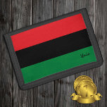 Portefeuille À 3 Volets Porte-monnaie du drapeau panafricain, Symbole de l<br><div class="desc">MORCEAUX : Symbole du drapeau panafricain - UNIA / Tribande horizontale de rouge,  noir et vert. Le drapeau panafricain—aussi connu sous le nom de drapeau afro-américain,  drapeau de libération noire,  drapeau de l'UNIA. Souvent utilisé avec le mouvement Black Lives Matter.</div>