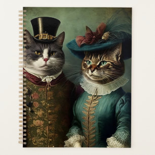 Portrait d'un couple de chats en vêtements de fant