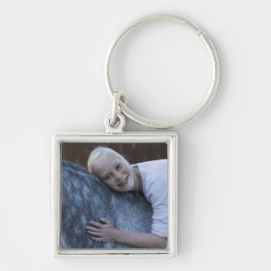 portret van het jonge meisje op het witte paard sleutelhanger