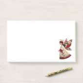 Post-it® Ange de Noël avec fleurs de fêtes (Sur un bureau)