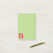 Post-it® B est pour la lettre sautante heureuse d'ABC de (Sur un bureau)