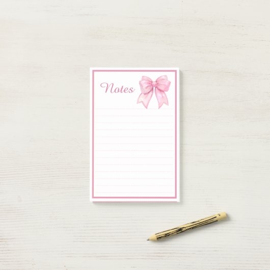 Post-it® Bloc-notes mignon avec ruban rose (Sur un bureau)