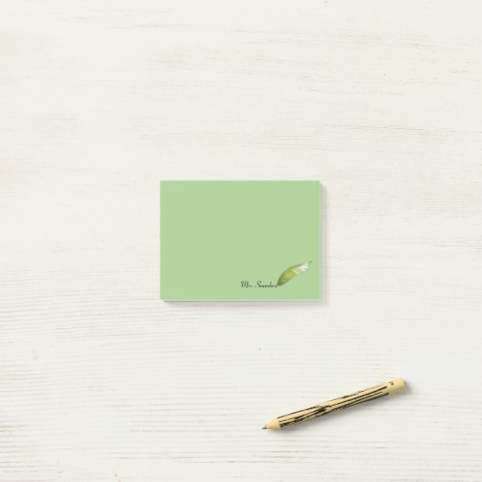 Post-it® Bloc-notes Post-it - Stylo en plume vert (Sur un bureau)