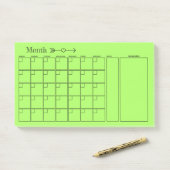 Post-it® Calendrier du planificateur mensuel vert (Sur un bureau)