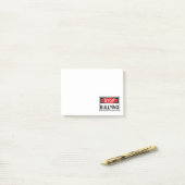 Post-it® Cesser le signe d'intimidation rouge (Sur un bureau)