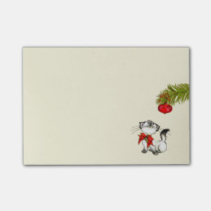 Post-it® Chat Kitty En Jeu Dans Une Bow De Noël Rouge