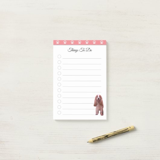 Post-it® Chien coquelicot mignon sur des choses roses et bl (Sur un bureau)