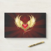 Post-it® Coeur rouge avec ailes d'or (Sur un bureau)
