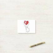 Post-it® Coeur rouge et un stéthoscope (Sur un bureau)