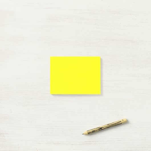 Post-it® Couleur uni jaune néon (Sur un bureau)