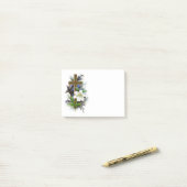 Post-it® Croix d'or avec la fleur blanche (Sur un bureau)