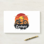 Post-it® Cycologiste Aventure à vélo : Tir graphique au cou (Sur un bureau)