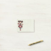 Post-it® Fille avec une poupée grenouille mignonne et fanta (Sur un bureau)