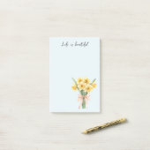 Post-it® Fleurs de jonquille jaune à ruban pêche (Sur un bureau)