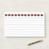 Post-it® Grands Papillons Autocollants Rouge Ladybug (Sur un bureau)