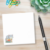 Post-it® Happy Cat on top of a Book Stack