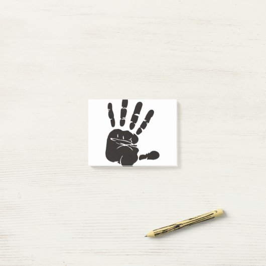Post-it® Impression main noir (Sur un bureau)