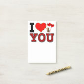 Post-it® Je t'aime avec des étreintes et des baisers (Sur un bureau)