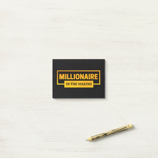 POST-IT® MILLIONNAIRE EN TRAIN DE FAIRE (Sur un bureau)
