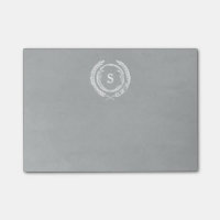Monogramme de laurier affligé par gris
