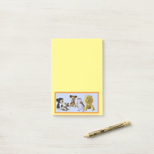 Post-it Note - Groupe d'animaux de jouets dans le  (Sur un bureau)