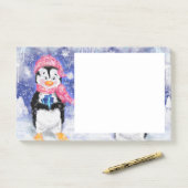 Post-it® Notes collantes de Noël Petit pingouin avec cadeau (Sur un bureau)