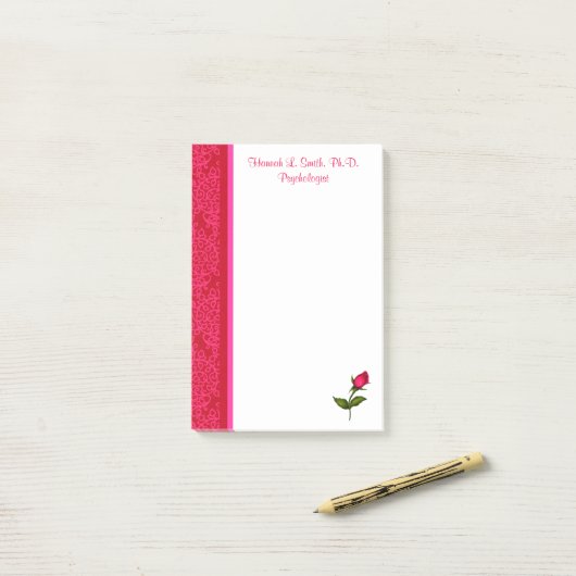 Post-it® Notes de post-it roses de remous rouges et roses (Sur un bureau)