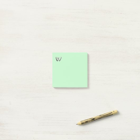 Post-it® Notes de post-it vert pâle pour la conception des (Sur un bureau)