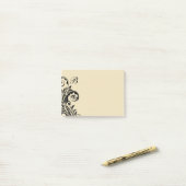 Post-it® Notes de post sur le monogramme floral (Sur un bureau)