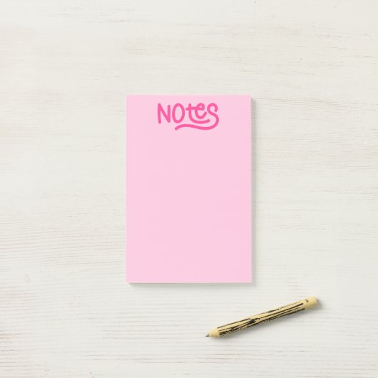 Post-it® Notes de typographie à l'écriture rose (Sur un bureau)