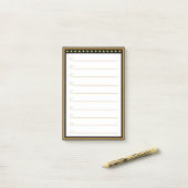 Post-it® Notes post-it à cadre noir or (Sur un bureau)