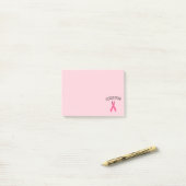Post-it® Papier-notes ruban de survivant du cancer rose (Sur un bureau)