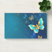 Post-it® Papillons d'or sur un Arrière - plan bleu (Bureau)