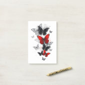 Post-it® Papillons noirs et rouges volants (Sur un bureau)