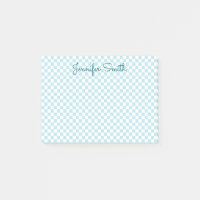 Petit œuf de merle bleu clair à carreaux