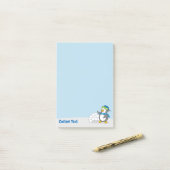 Post-it® Petit pingouin avec boules de neige agitant Post-i (Sur un bureau)
