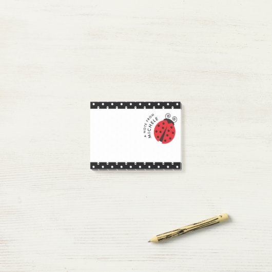 Post-it® Petites notes mignonnes de point de polka de (Sur un bureau)