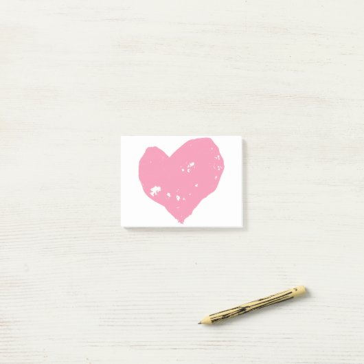 Post-it® Post-it avec un cœur rose (Sur un bureau)
