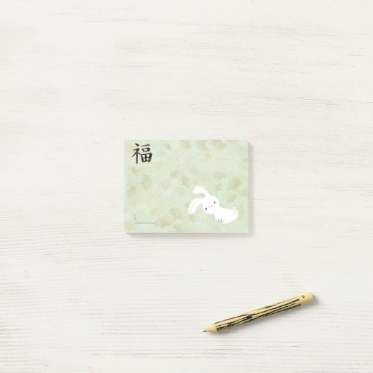 Post-it® Post-it chanceux de lapin (Ginkgo) (Sur un bureau)