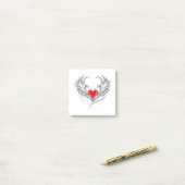 Post-it® Red Angel Coeur avec ailes (Sur un bureau)