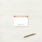 Post-it® Rouge, orange, bleu (Sur un bureau)