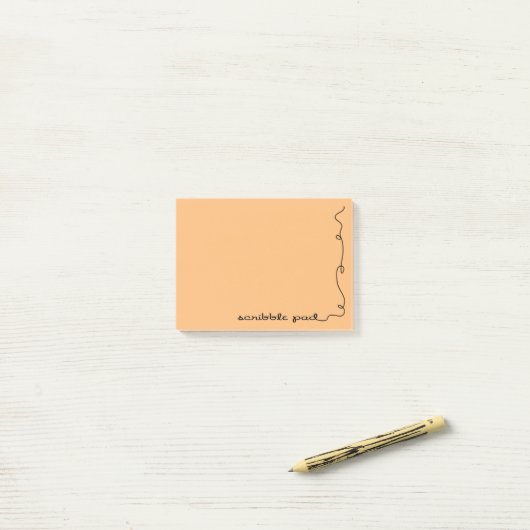 Post-it® Scribble Pad orange (Sur un bureau)
