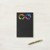 Post-it® Symbole de l'infini des comètes arc-en-ciel (Sur un bureau)