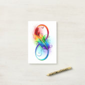 Post-it® Symbole infini avec plume arc-en-ciel (Sur un bureau)