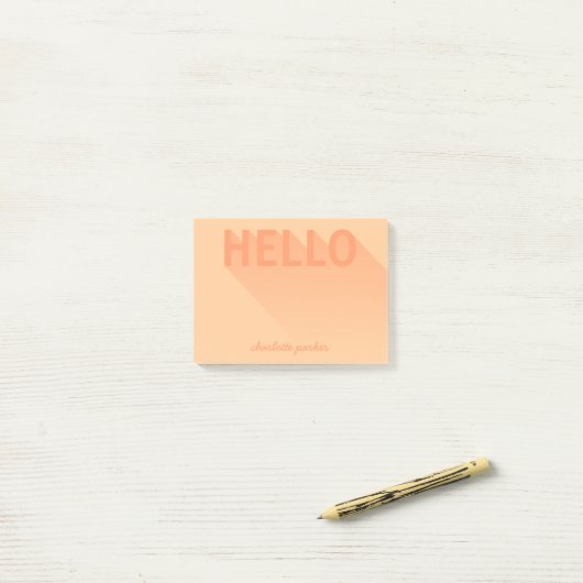Post-it® Typographie moderne Orange Hello (Sur un bureau)