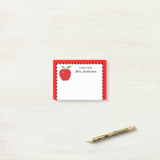 Post-it® Une note de professeur avec Apple rouge (Sur un bureau)