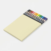 Post-it® Une rangée de crayons colorés. (Incliné)