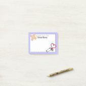 Post-it® van het schoolverpleegkundigen post-it® notes (Op bureau)
