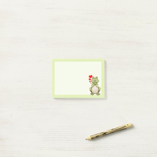 Post-it® Vert de dessin d'amour de la grenouille mûre (Sur un bureau)