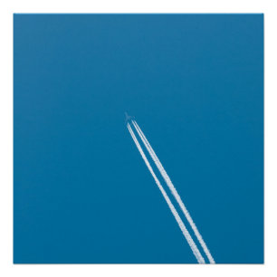 Poster Avion en vol sur fond de ciel bleu